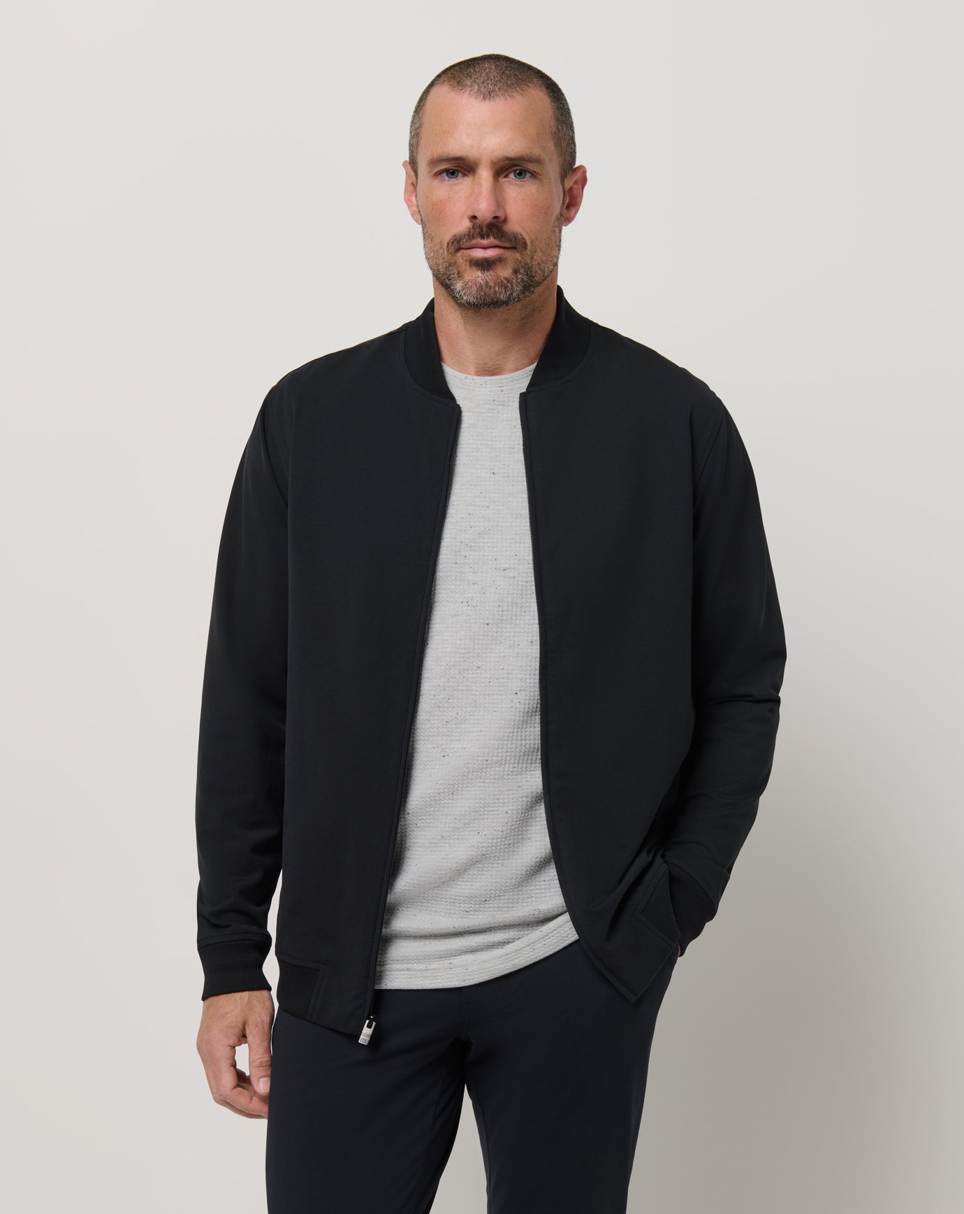 TravisMathew Men's Stretchknit Bomber Jacket in Black, Size XL TravisMathew Men's Stretchknit Bomber Jacket in Black, Size XL