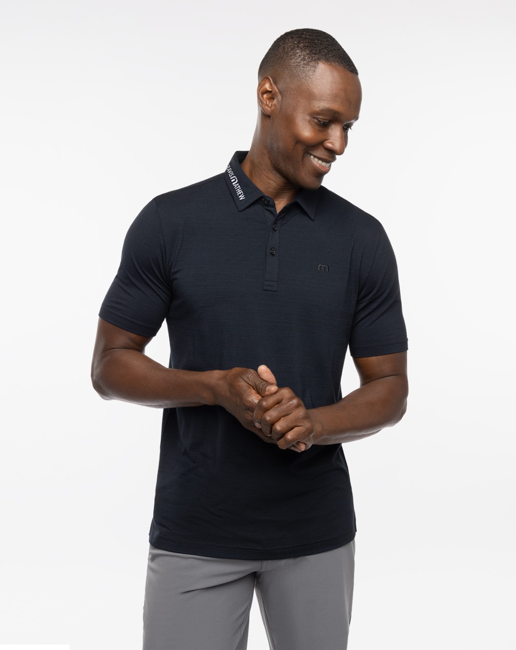 Travis mathew black outlet polo